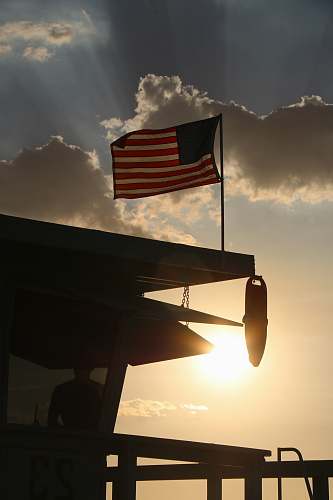 venice beach silhouette photography of U.S.A. flag los angeles